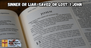 Sin contradiction in 1 John featured image showing a bible opened to the book of 1 John.